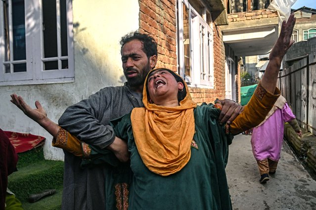 Relatives and neighbours of Ahsan Ul Haq Sheikh, who is suspected of involvement in the Pahalgam tourist attack, mourn after their house was demolished in Murran village of Pulwama, south of Srinagar, on April 26, 2025. Soldiers in Indian-administered Kashmir on April 25 blew up the family homes of two men who police allege were among a gang that carried out the region's deadliest attack against civilians for decades. (Photo by Tauseef Mustafa/AFP Photo)