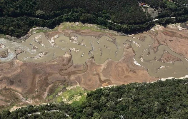 An aerial view of the Atibainha dam, part of the Cantareira reservoir, during a drought in Nazare Paulista, Sao Paulo state November 18, 2014. (Photo by Nacho Doce/Reuters)