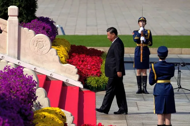 Chinese President Xi Jinping walks towards the Monument to the People's Heroes during a ceremony to mark Martyr's Day at Tiananmen Square in Beijing on Wednesday, September 30, 2020. (Photo by Ng Han Guan/AP Photo)