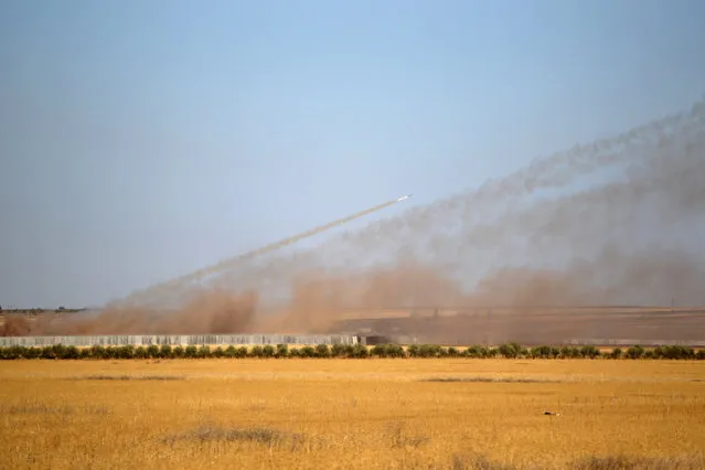 Rockets are launched from Turkey towards Islamic State controlled areas in northern Aleppo countryside, Syria September 30, 2016. (Photo by Khalil Ashawi/Reuters)