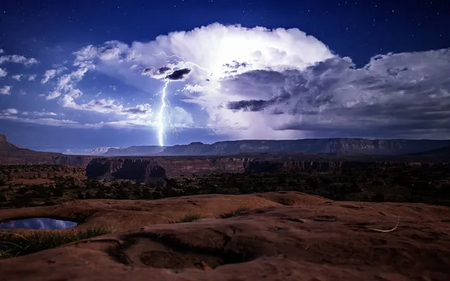 A lightning storm over the grand canyon. (Photo by Dustin Farrell/Caters News)