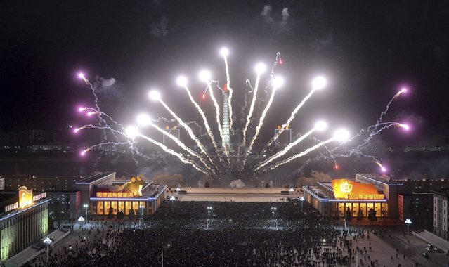 Fireworks explode in the sky over Kim Il-sung Square in Pyongyang in this undated photo released by North Korea's Korean Central News Agency (KCNA) in Pyongyang January 1, 2015. (Photo by Reuters/KCNA)