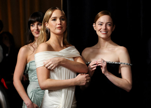 Emma Stone, Jennifer Lawrence and Dakota Johnson attend the Academy of Motion Picture Arts and Sciences 16th Governors Awards in Los Angeles, California, U.S., November 16, 2025. (Photo by Mario Anzuoni/Reuters)