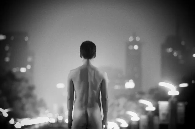 “A Weak Road №1, 2012”. Nakedness is a recurrent theme in Beijing-based photographer’s work. “When I was a kid, in China”, he has said, “I learned that to humiliate someone, you needed to undress him and to expose him in public”. (Photo by Liu Tao/The Guardian)