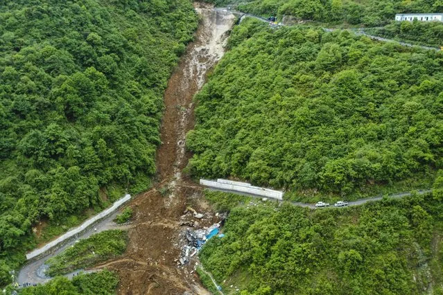 This aerial photo released by the Xinhua News Agency shows the site of a mountain collapse in Leshan in southwestern China's Sichuan Province on Sunday, June 4, 2023. A landslide tore through a mining company's worker dormitory early Sunday morning in southwestern China, killing more than a dozen people, authorities said. (Photo by Xinhua via AP Photo)