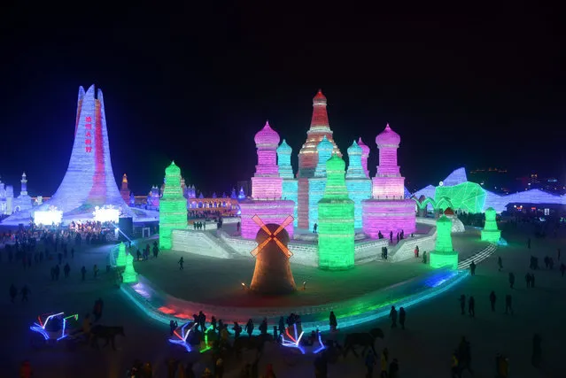 This picture shows a general view of the opening ceremony of the Harbin International Ice and Snow Festival at the China Ice and Snow World in Harbin, northeast China's Heilongjiang province on January 5, 2016. (Photo by Wang Zhao/AFP Photo)