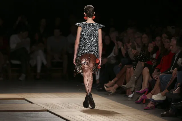 A model presents a creation by London-based Portuguese designer Olga Noronha during the 51st Lisbon Fashion Week, in Lisbon, Portugal, 14 October 2018. (Photo by Jose Sena Goulao/EPA/EFE)