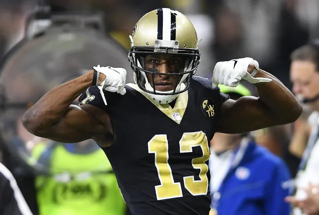 New Orleans Saints wide receiver Michael Thomas (13) celebrates a run against the Philadelphia Eagles in the first half of an NFL divisional playoff football game in New Orleans, Sunday, January 13, 2019. (Photo by Bill Feig/AP Photo)
