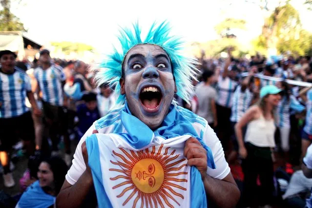 An Argentina fan celebrates the victory at full time during the FIFA World Cup Qatar 2022 match, Group C, between Argentina and Mexico played at Lusail Stadium on Nov 26, 2022 in Lusail, Qatar. (Photo by Agustin Marcarian/Reuters)