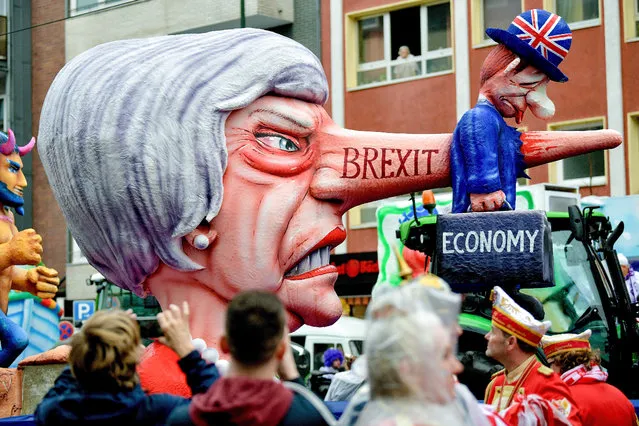 A Brexit-themed float with a figure of Britain's Prime Minister Theresa May (L) during the annual Rose Monday parade in Duesseldorf, Germany, 04 March 2019. Rose Monday is the traditional highlight of the carnival season in many German cities. (Photo by Kirsten Neumann/EPA/EFE)