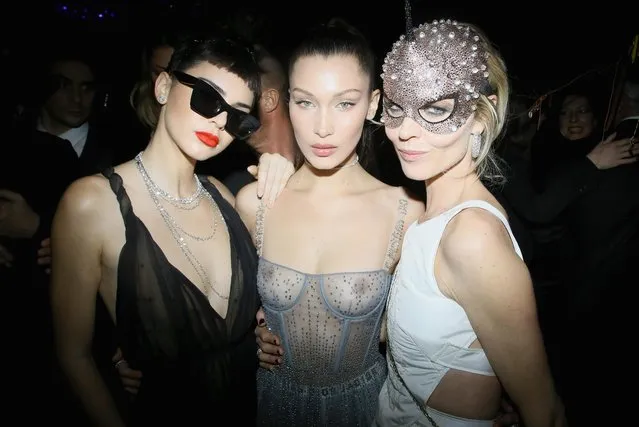 (L to R) Kendall Jenner, Bella Hadid and Eva Herzigova attend the Christian Dior Haute Couture Spring Summer 2017 Bal Masque as part of Paris Fashion Week on January 23, 2017 in Paris, France. (Photo by Victor Boyko/Getty Images for Dior)
