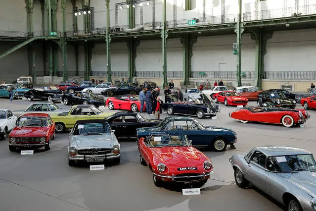 Vintage and classic cars are displayed by Bonhams auction house at the Grand Palais exhibition hall during the Retromobile week in Paris, France, February 8, 2017. (Photo by Benoit Tessier/Reuters)