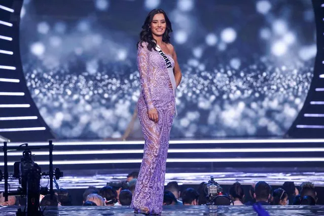 Miss Turkey, Cemrenaz Turhan, presents herself on stage during the preliminary stage of the 70th Miss Universe beauty pageant in Israel's southern Red Sea coastal city of Eilat on December 10, 2021. (Photo by Menahem Kahana/AFP Photo)