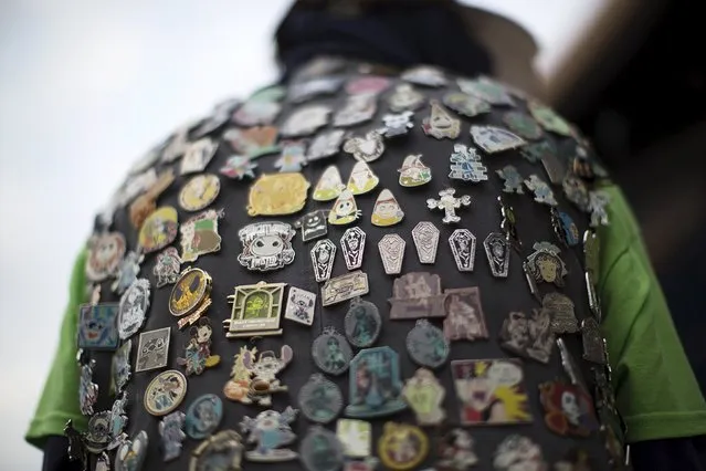 Pins are pictured on the vest of guest Ben Green during Disneyland's Diamond Celebration in Anaheim, California May 22, 2015. (Photo by Mario Anzuoni/Reuters)