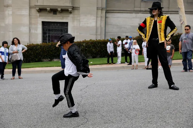 Fans gather at Forest Lawn Cemetery ten years after the death of child star turned King of Pop, Michael Jackson, in Glendale, California, U.S., June 25, 2019. (Photo by Mike Blake/Reuters)