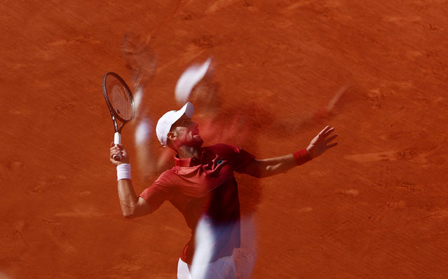 Serbia's Novak Djokovic in action during his fourth round match against Argentina's Francisco Cerundolo at the French Open on June 3, 2024. (Photo by Yves Herman/Reuters)