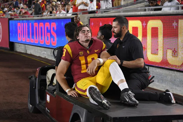 Southern California quarterback JT Daniels is carted off the field after being injured during the first half of an NCAA college football game against Fresno State Saturday, August 31, 2019, in Los Angeles. (Photo by Mark J. Terrill/AP Photo)