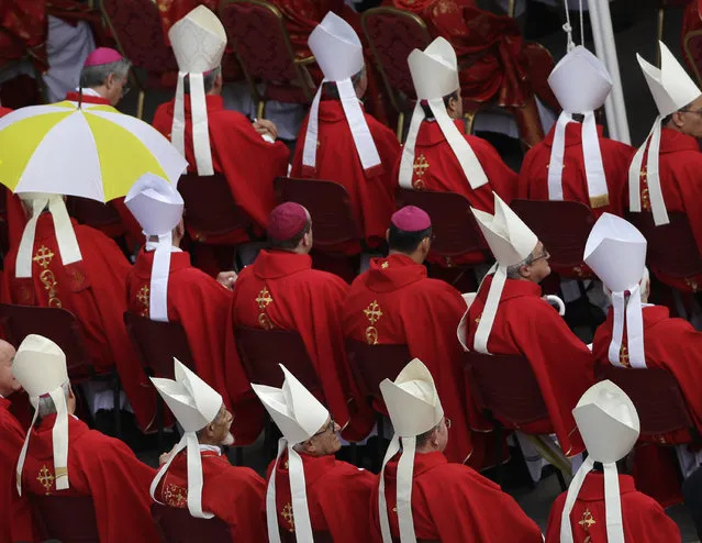 Cardinals and bishops attend a special mass celebrated by Pope Francis for Roman holiday of St. Peter and St. Paul in St. Peter's square at the Vatican, Thursday, June 29, 2017. (Photo by Gregorio Borgia/AP Photo)