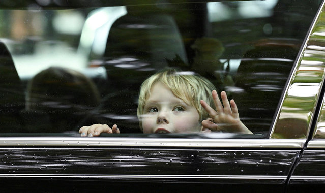 James Kennedy, a great-grandson of Ethel Kennedy and the son Joseph P. Kennedy III, sits in the back of a limousine following the funeral mass of Ethel Kennedy, a long-time human rights advocate who endured a series of tragedies that included the assassination of her husband, Robert F. Kennedy, at Our Lady of Victory Church in Centerville, Massachusetts on October 14, 2024. (Photo by Ken McGagh/Reuters)