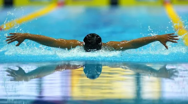 Kinley Lhendup of Bhutan competes during his men's 100m butterlfy heat at the 19th FINA World Championships in Budapest, Hungary, Thursday, June 23, 2022. (Photo by Petr David Josek/AP Photo)