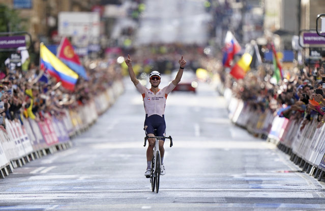 Netherlands' Mathieu van der Poel celebrates after winning on day four of the 2023 UCI Cycling World Championships in Glasgow, Scotland, Sunday August 6, 2023. (Photo by Tim Goode/PA Wire via AP Photo)
