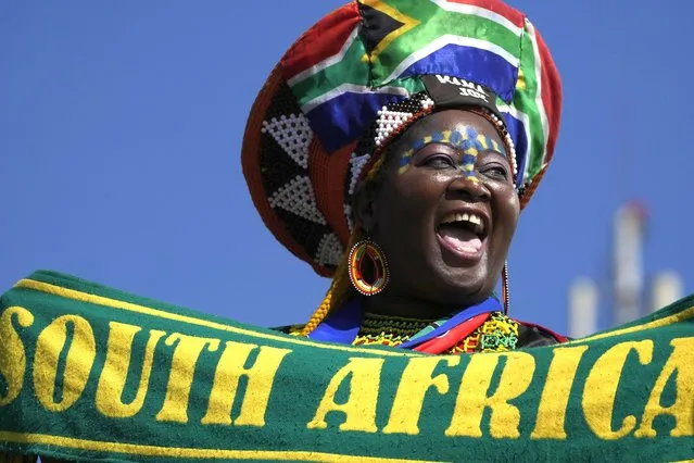A fan reacts during the team victory welcome at the OR Tambo International Airport in Johannesburg, South Africa, Tuesday, July 26, 2022, after the team's victory at the Women's Africa Cup of Nations in Morocco on 23 July 2022. (Photo by Themba Hadebe/AP Photo)