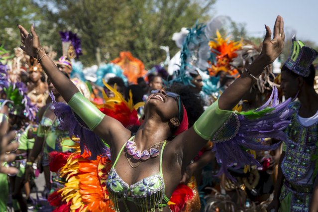 A participant dances during the West Indian Day Parade in Brooklyn, New York September 7, 2015. (Photo by Andrew Kelly/Reuters)