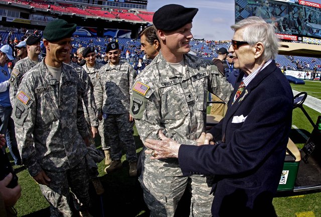 Tennessee Titans owner Bud Adams greets soldiers from Fort Campbell, Kentucky before the Titans face the Bears in Nashville. (Photo by Wade Payne/Associated Press)