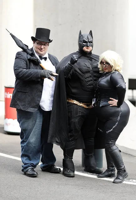 Comic Con attendees pose as DC characters during the 2014 New York Comic Con at Jacob Javitz Center on October 10, 2014 in New York City. (Photo by Daniel Zuchnik/Getty Images)