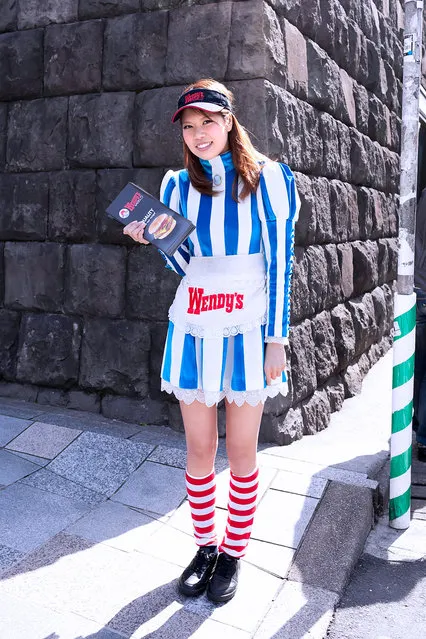 A Japanese girl cutely dressed up as Wendy promoting the Wendy's fast food restaurant in the Omotesando area of Tokyo, Japan. (Tokyo Fashion)