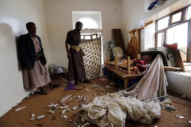 Yemenis inspect their house damaged by an alleged Saudi-led airstrike targeting a neighborhood in Sana'a, Yemen, 31 August 2016. According to reports, at least 20 Yemenis were killed and dozens others injured in airstrikes carried out by the Saudi-led military coalition in several Yemeni cities, including the capital Sana'a. (Photo by Yahya Arhab/EPA)