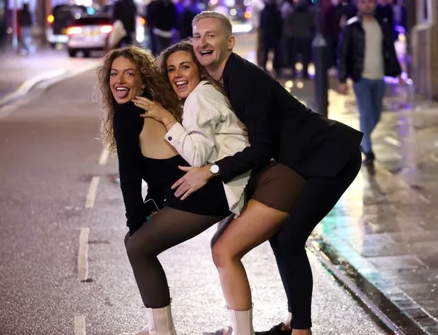 Partygoers in Leeds, United Kingdom didn't let the cold bother them as they enjoyed their night out on December 25, 2022. (Photo by Nb press ltd)