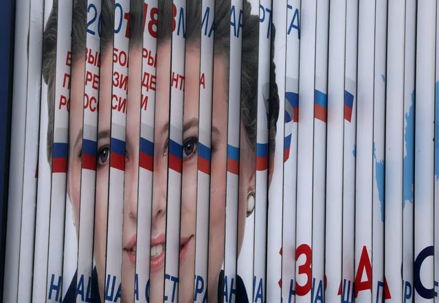 An election campaign billboard promoting presidential candidate for the Grazhdanskaya Initsiativa Party, Ksenia Sobchak, seen in a street in Moscow, Russia on February 18, 2018; Russia is to hold a presidential election on March 18, 2018. (Photo by Mikhail Pochuyev/TASS)