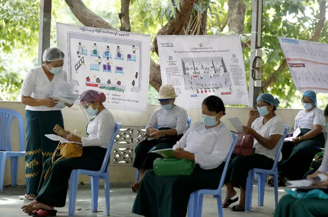 Teachers attend the training program for general elections in Yangon, Myanmar, 21 October 2020. Myanmar is expected to have its general elections on 08 November, amid the coronavirus pandemic. (Photo by Nyein Chan Naing/EPA/EFE/Rex Features/Shutterstock)