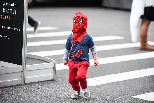A Comic Con attendee poses as Spiderman during 2016 New York Comic Con – Day 1 on October 6, 2016 in New York City. (Photo by Daniel Zuchnik/Getty Images)