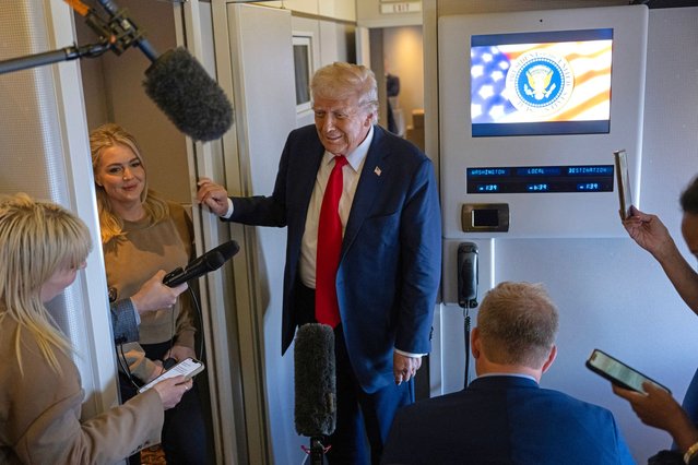 US President Donald Trump speaks to the press as he flies back to the United States from the United Kingdom onboard Air Force One on September 18, 2025. (Photo by Andrew Caballero-Reynolds/AFP Photo)