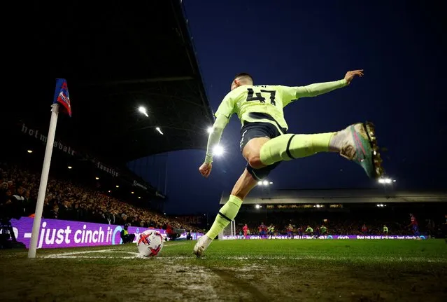 Manchester City's Phil Foden takes a corner kick in a match against Crystal Palace at Selhurst Park in London on March 11, 2023. (Photo by John Sibley/Action Images via Reuters)