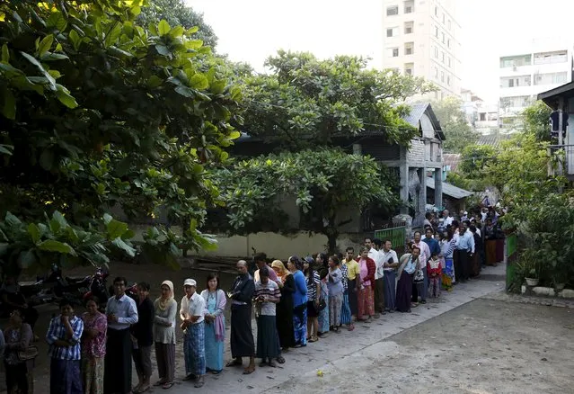 People line up to vote in a mixed Muslim, Buddhist and Hindu neighbourhood during the general election in Mandalay, Myanmar, November 8, 2015. (Photo by Olivia Harris/Reuters)