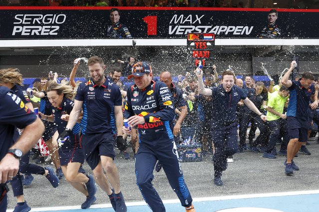 Red Bull driver Max Verstappen of the Netherlands celebrates with team members after winning the Formula 1 Spanish Grand Prix race at the Barcelona Catalunya racetrack in Montmelo, near Barcelona, Spain, Sunday, June 23, 2024. (Photo by Joan Monfort/AP Photo)