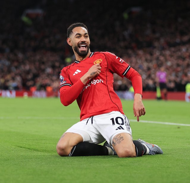 Manchester United's Matheus Cunha celebrates scoring their side's first goal during the Premier League match at Old Trafford, Manchester on Saturday, October 25, 2025. (Photo by Martin Rickett/PA Images via Getty Images)