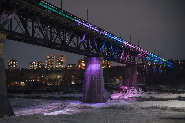 Edmonton's High-level Bridge is lit up for New Year's Eve in Edmonton, Alberta, Thursday, December 31, 2020. (Photo by Amber Bracken/The Canadian Press via AP Photo)