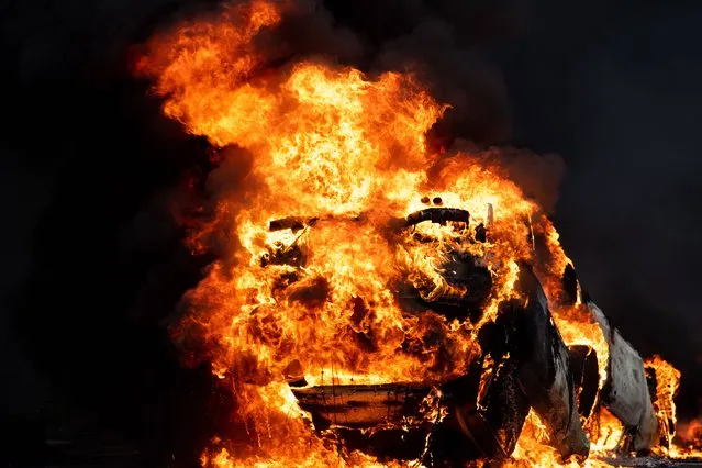 Burning cars in the French capital on June 29, 2023 following riots after a 17-year-old boy was shot in the chest by police at point-blank range in Nanterre. (Photo by Jeanne Accorsini/SIPA Press/Rex Features/Shutterstock)