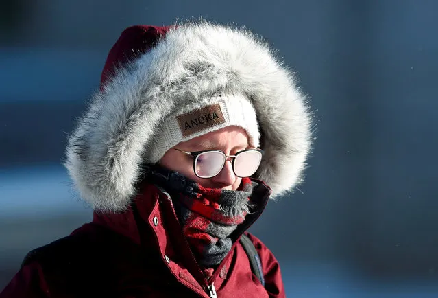 A student’s glasses fog in subzero temperatures while walking to class at the University of Minnesota in Minneapolis, Minnesota, U.S., January 29, 2019. (Photo by Eric Miller/Reuters)
