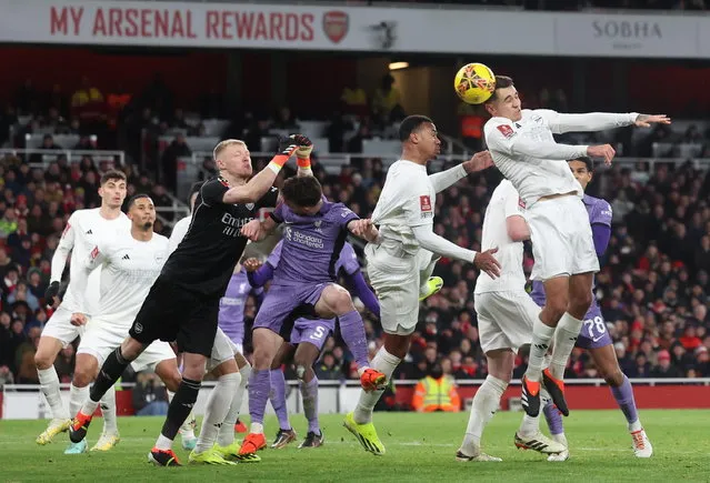 Arsenal's Jakub Kiwior (R) score an own goal during the FA Cup Third Round soccer match between Arsenal FC and Liverpool FC in London, Britain, 07 January 2024. (Photo by Neil Hall/EPA)