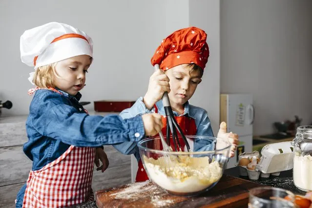 Fun family moments making and cooking gluten free pasta at home. (Photo by Westend61/Getty Images0