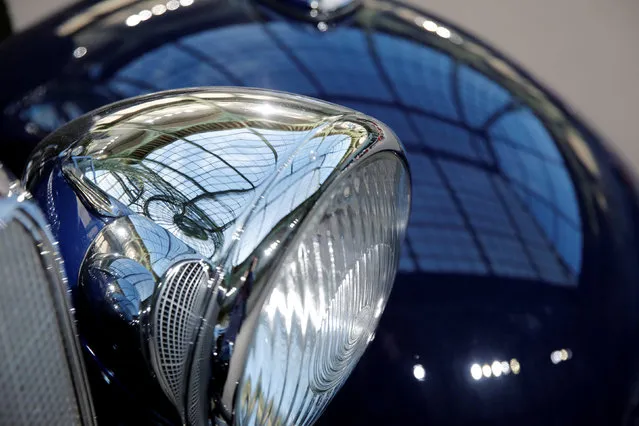 A detail view of a headlamp on a Mercedes-Benz 320 3.2-Litre Cabriolet B during an exhibition of vintage and classic cars by Bonhams auction house at the Grand Palais during the Retromobile week in Paris, France, February 8, 2017. (Photo by Benoit Tessier/Reuters)