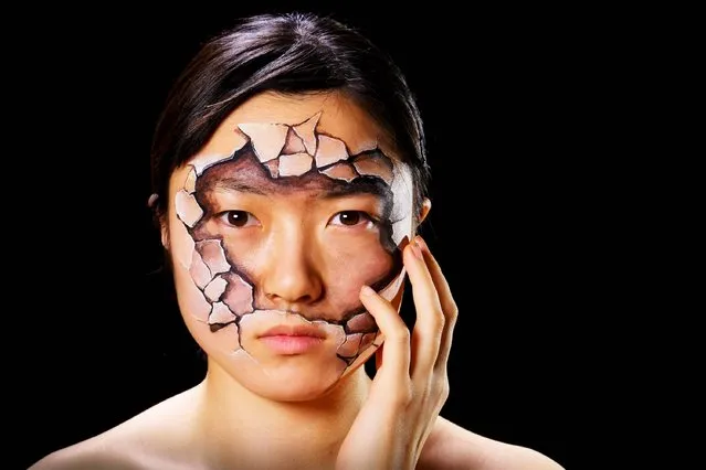 Undated handout photo issued by Amnesty International of body art painted onto a model by Tokyo-based artist Hikaru Cho as part of Amnesty International's global campaign “My Body My Rights” on sexual and reproductive rights, which launches on 6 March 2014. Hikaru Cho's special effects make-up has a repertoire that ranges from designing mobile apps to creating movie masks and printed pantyhose and is about more than just shock. (Photo by Jim Marks/PA Wire)