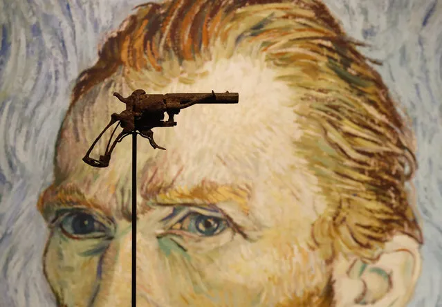 A revolver believed to be the gun Dutch 19th century painter Vincent Van Gogh would have used to kill himself on 27 July 1890 is on public display at Paris' Drouot auction house on June 19, 2019 before it goes under the hammer later today. The gun was found in the field where the artist committed suicide in Auvers-sur-Oise by a farmer around 1960 and was handed to the current owner's mother. (Photo by Francois Guillot/AFP Photo)