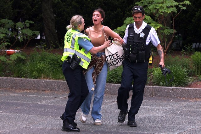Chicago Police officers detain a woman during arrests of dozens of Pro-Palestinian protesters at the Art Institute of Chicago in Chicago, Illinois, USA, 04 May 2024. Protests on school campuses are continuing nationwide, with pro-Palestine encampments calling on institutions to divest investments in Israel and in support of a ceasefire in the Gaza conflict, and occasional counterprotests in support of Israel. (Photo by Alex Wroblewski/EPA/EFE)