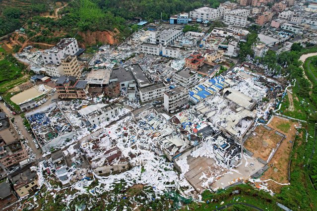 An aerial view taken on April 28, 2024 shows destroyed and damaged buildings in an affected area after a tornado hit Guangzhou, in Southern China's Guangdong province. At least five people were killed and 33 injured after a tornado struck the Chinese city of Guangzhou on April 27, state media reported. (Photo by AFP Photo/China Stringer Network)